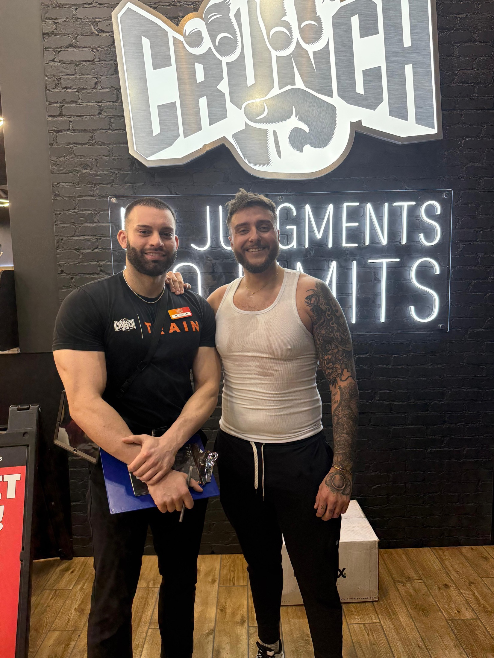 Jake Garza with a Crunch Central Forest member after a training session